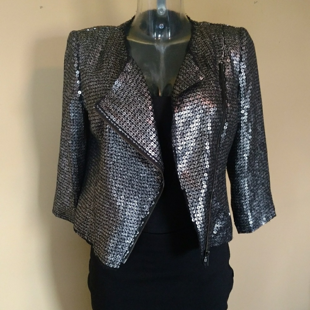 Sequence- covered blazer.